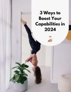 3 Ways to Boost Your Capabilities in 2024 - woman holding upside-down yoga pose in a doorframe.
