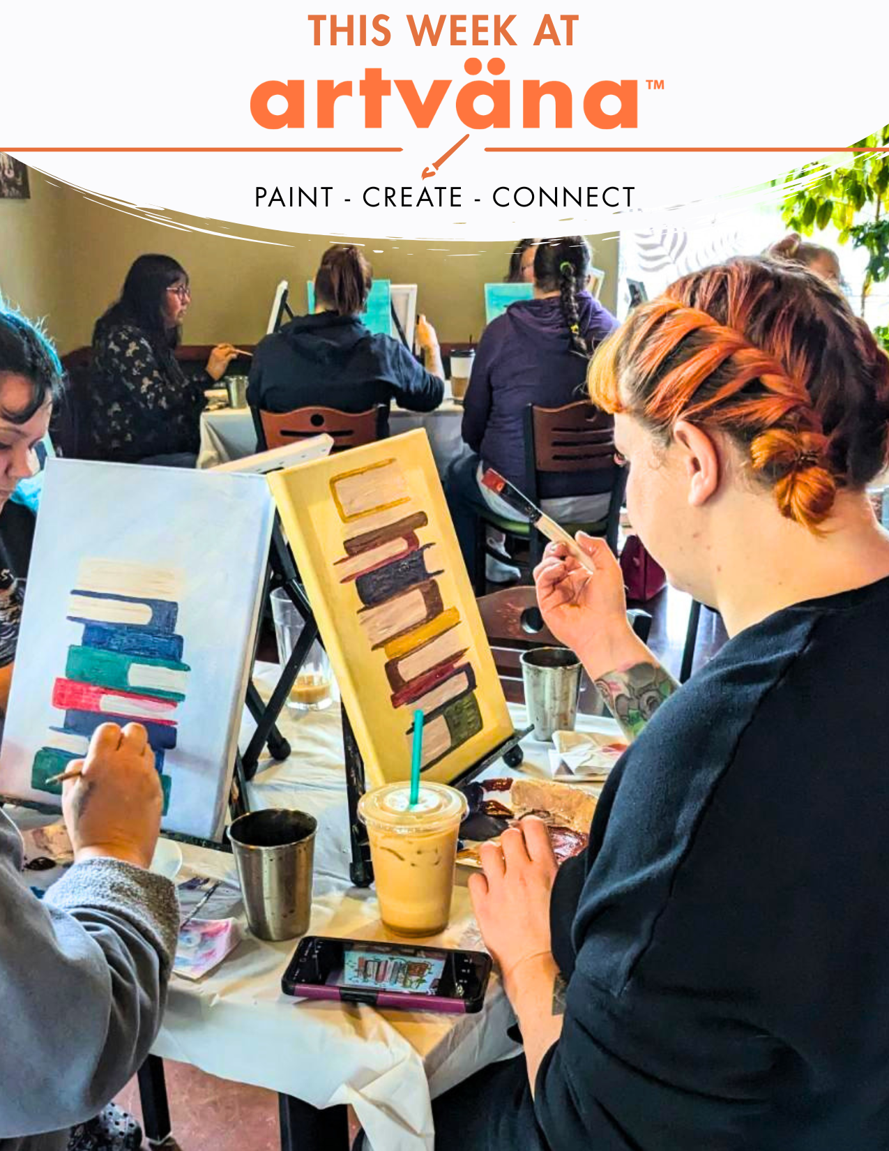 people painting at stack of books at an artvana paint and sip in lacey washington